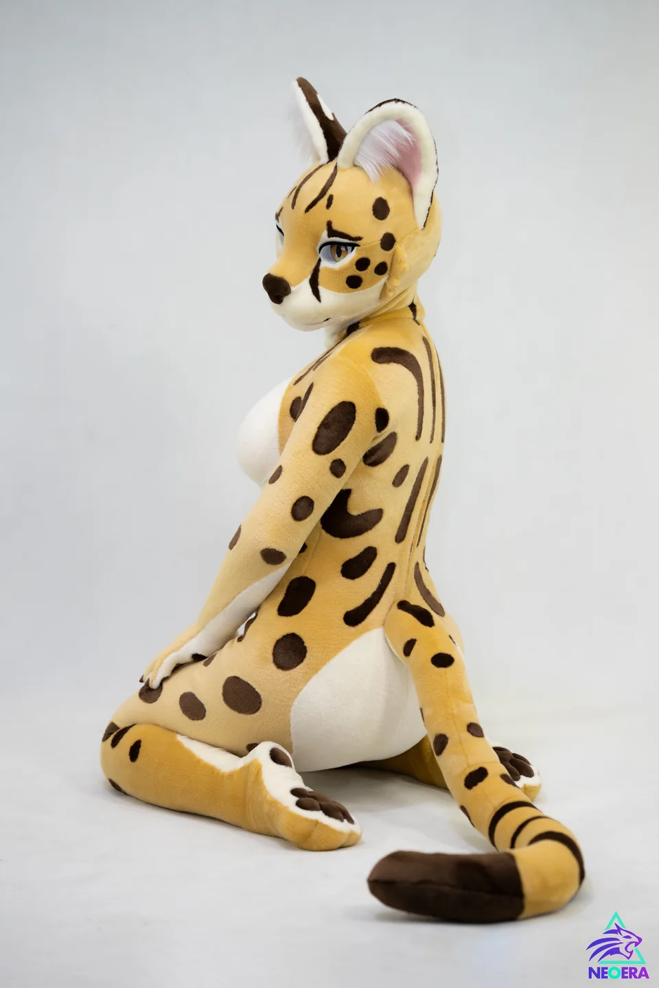 Tall-eared golden spotted feline, CHI series, studio photograph