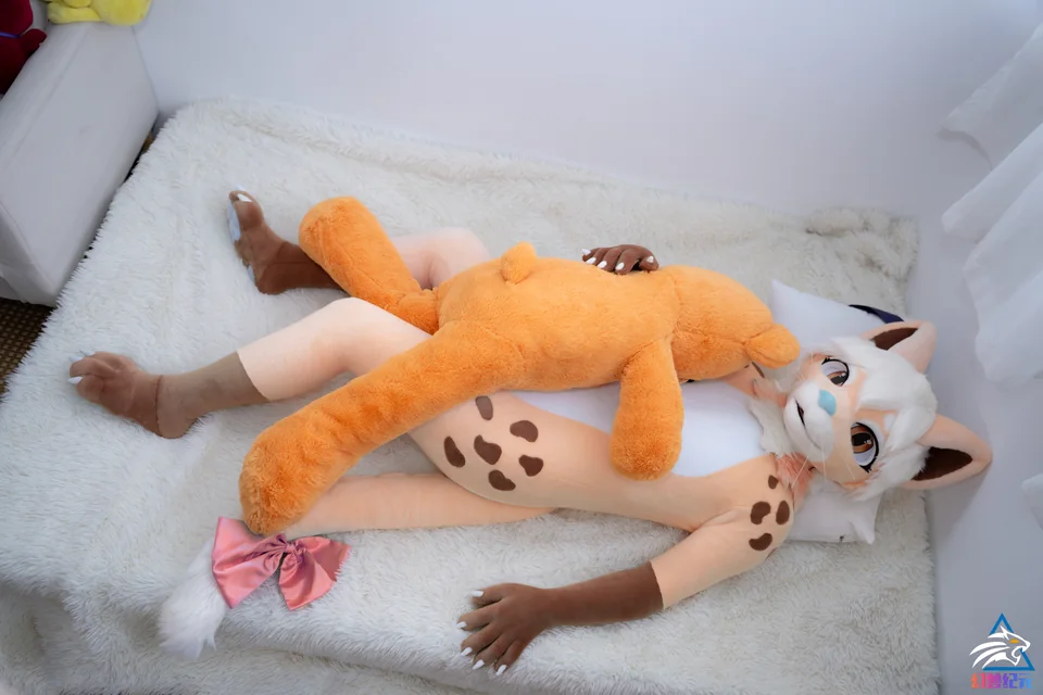 Peach feline with brown boots and cyan nose, CHI series, studio photograph