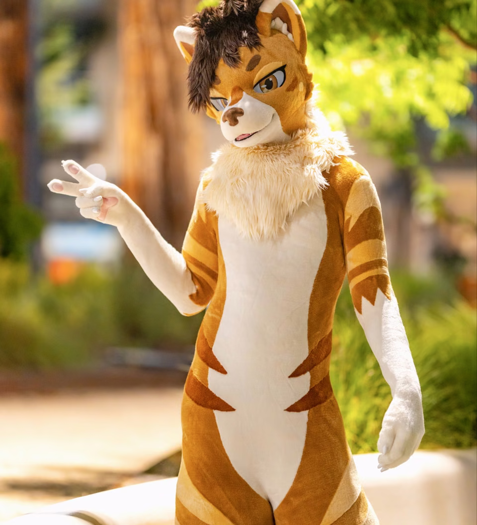 Golden NEOERA character outdoors in sunlight